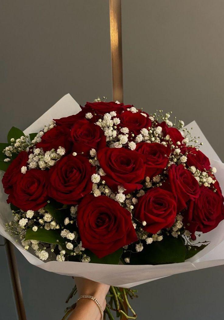 Corporate meeting room with carefully timed floral arrangements that maintain elegance throughout business hours